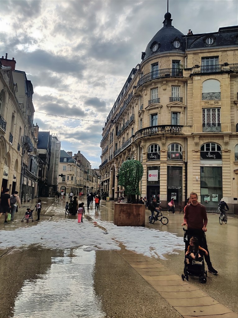 Street in Dijon, France covered in hail after a storm